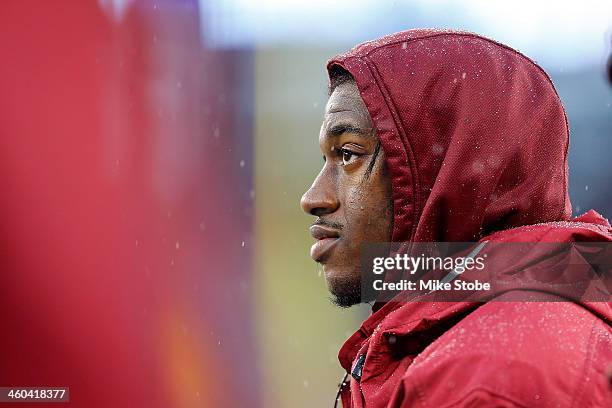 Robert Griffin III of the Washington Redskins looks on during the game against the New York Giants at MetLife Stadium on December 29, 2013 in East...