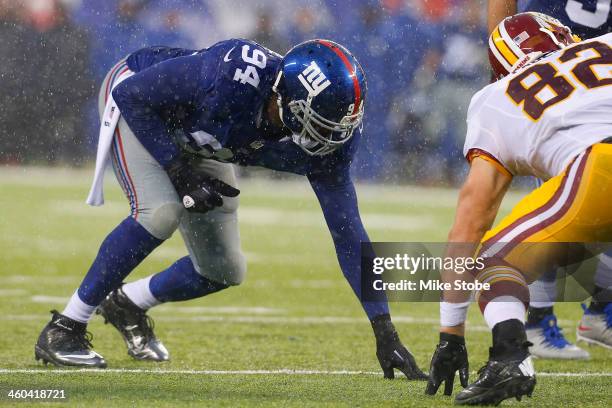 Mathias Kiwanuka of the New York Giants in action against the Washington Redskins at MetLife Stadium on December 29, 2013 in East Rutherford, New...