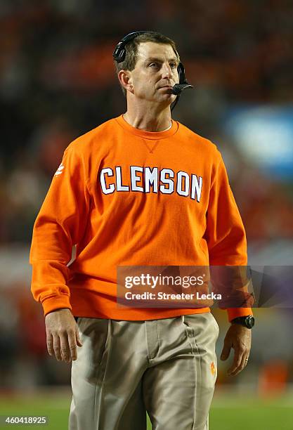 Head coach Dabo Swinney of the Clemson Tigers looks on during the first half against the Ohio State Buckeyes during the Discover Orange Bowl at Sun...