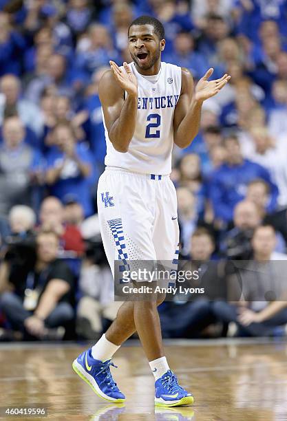Aaron Harrison of the Kentucky Wildcats celebrates during the game against the North Carolina Tar Heels at Rupp Arena on December 13, 2014 in...