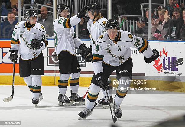 Michael McCarron of the London Knights is all smiles after setting up teammate Julius Bergman for a long empty net goal against the Plymouth Whalers...