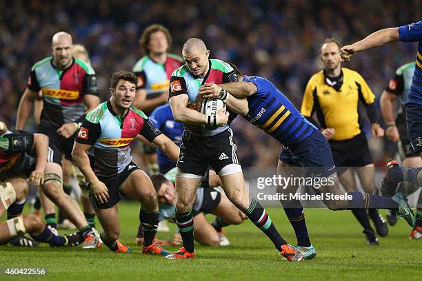 Mike Brown of Harlequins surges through the challenge of Rob Kearney of Leinster during the European Rugby Champions Cup Pool Two match between...