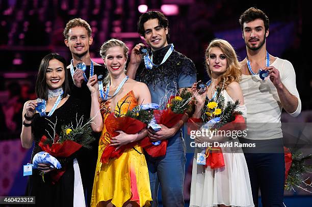 Madison Chock and Evan Bates of USA, Kaitlyn Weaver and Andrew Poje of Canada and Gabriella Papadakis and Guillaume Cizeron of France pose for the...