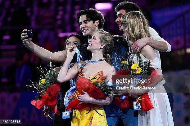 Madison Chock and Evan Bates of USA, Kaitlyn Weaver and Andrew Poje of Canada and Gabriella Papadakis and Guillaume Cizeron of France make a selfie...