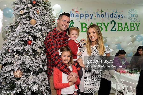 Cash Warren, Jessica Alba, Honor Warren and Haven Warren attend Baby2Baby Holiday Party Presented By The Honest Company at Baby2Baby Headquarters on...