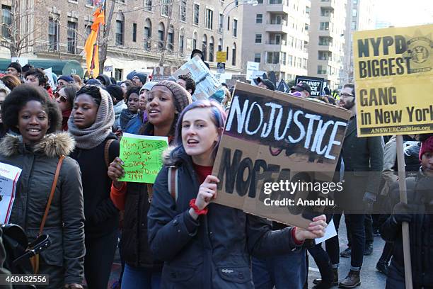 Thousands of protestors converge on Manhattan's Washington Square Park to march through the Manhattan to protest the police violence on December 13,...