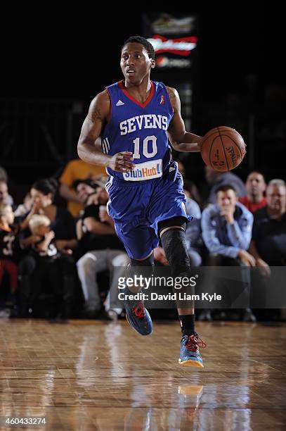 Nolan Smith of the Delaware 87ers brings the ball up the court against the Canton Charge at the Canton Memorial Civic Center on December 13, 2014 in...