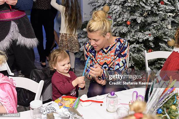 Busy Philipps and Birdie Silverstein attend Baby2Baby Holiday Party Presented By The Honest Company on December 13, 2014 in Los Angeles, California.