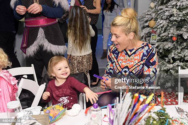 Busy Philipps and Birdie Silverstein attend Baby2Baby Holiday Party Presented By The Honest Company on December 13, 2014 in Los Angeles, California.