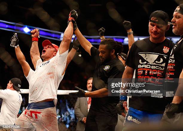 Junior dos Santos celebrates after defeating Stipe Miocic by unanimous decision in their heavyweight bout during the UFC Fight Night event at the at...