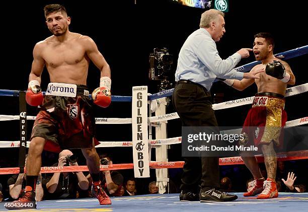 Abner Mares walks away after the referee steps in front of Jose Ramirez during their super featherweight fight at the MGM Grand Garden Arena on...