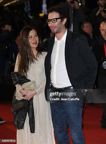 Manu Levy and his wife Alina Schiau arrive at the16th NRJ Music Awards held at the Palais des Festivals on the Croisette Avenue on December 13, 2014...