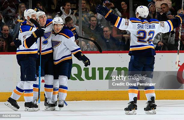 Oshie of the St. Louis Blues celebrates his game winning goal in overtime against the Colorado Avalanche with teammates Barret Jackman, Jaden...