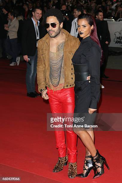 Lenny Kravitz and Shy'm arrive at the 16th NRJ Music Awards at the Palais des Festivals on December 13, 2014 in Cannes, France.