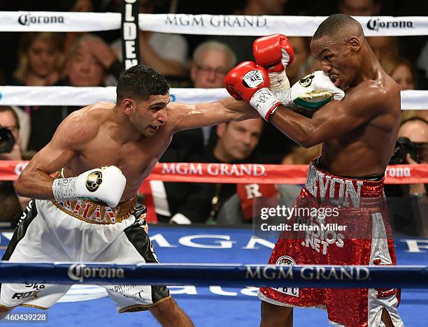 Amir Khan hits Devon Alexander in the fifth round of their welterweight bout at the MGM Grand Garden Arena on December 13, 2014 in Las Vegas, Nevada....