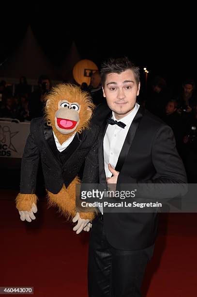 Ventriloquist Jeff Panacloc and Jean-Marc attend the NRJ Music Awards at Palais des Festivals on December 13, 2014 in Cannes, France.
