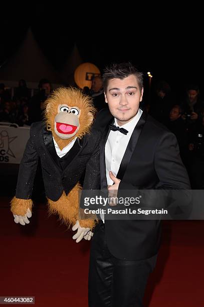 Ventriloquist Jeff Panacloc and Jean-Marc attend the NRJ Music Awards at Palais des Festivals on December 13, 2014 in Cannes, France.