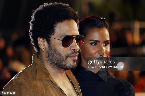 Singer and actor Lenny Kravitz and French singer Shy'm pose while arriving at the Palais des Festivals to attend the 16th Annual NRJ Music Awards on...