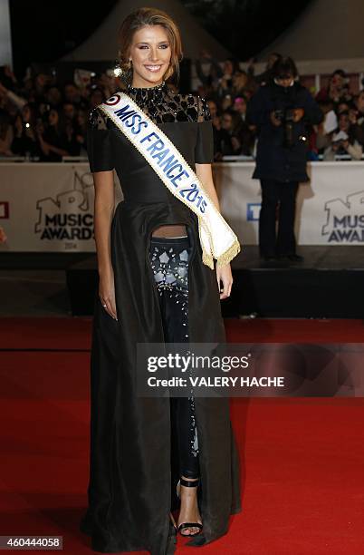Miss France 2015 Camille Cerf poses while arriving at the Palais des Festivals to attend the 16th Annual NRJ Music Awards on December 13, 2014 in...