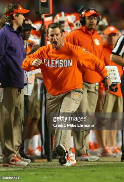 Head coach Dabo Swinney of the Clemson Tigers reacts on the sideline in the third quarter against the Ohio State Buckeyes during the Discover Orange...