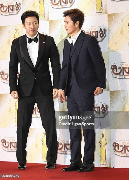 Kim Su-Ro and Kim Min-Jong arrive at the red carpet of the 2013 SBS drama awards at SBS Prism Tower on December 31, 2013 in Seoul, South Korea.