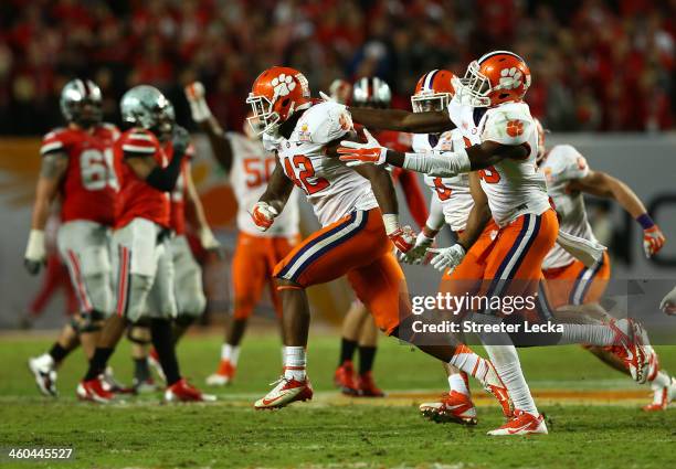 Stephone Anthony of the Clemson Tigers celebrates with teammates after an interception late in the game against the Ohio State Buckeyes during the...