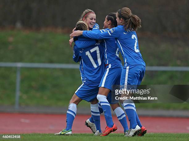 Madeleine Wojtecki of Luebars jubilates with team mates after scoring the second goal during the Women's Second Bundesliga match between 1.FC Luebars...