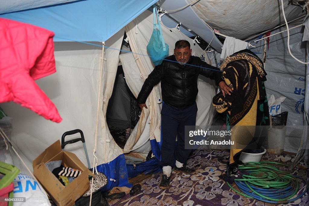 Heavy rain worsens living conditions of Iraqis at Baharka refugee camp in Arbil
