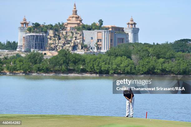 Anirban Lahiri of India plays a shot during round four of the Thailand Golf Championship at Amata Spring Country Club on December 14, 2014 in Chon...