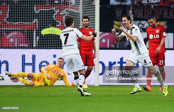 Roel Brouwers of Moenchengladbach celebrates his team's first goal with team mate Patrick Herrmann during the Bundesliga match between Bayer 04...