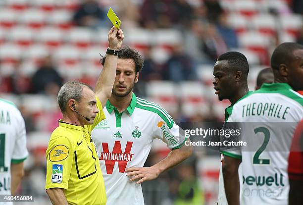 Ismael Diomande of Saint-Etienne receives a yellow card from referee Lionel Jaffredo during the French Ligue 1 match between OGC Nice and AS...