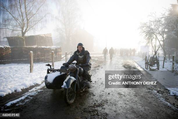 Actors in period German uniforms take part in the reanactment of the 70th anniversary of the Battle of the Ardennes also known as the Ardennes...