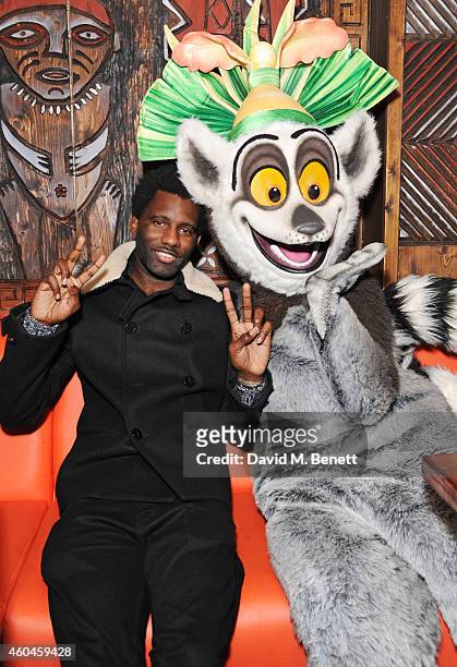 Wretch 32 poses with King Julien at the screening of Netflix Original Series 'All Hail King Julien' at Mahiki on December 14, 2014 in London, England.