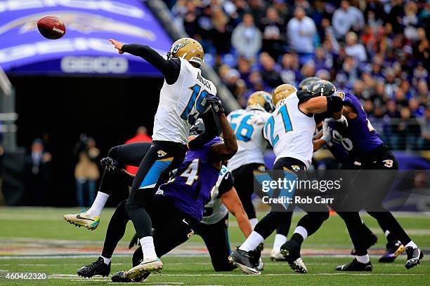 Free safety Darian Stewart of the Baltimore Ravens blocks the punt of punter Bryan Anger of the Jacksonville Jaguars in the first quarter at M&T Bank...