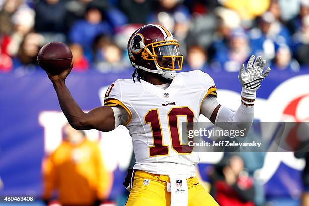 Robert Griffin III of the Washington Redskins throws a pass in the second quarter against the New York Giants during their game at MetLife Stadium on...