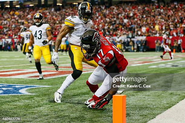 Devin Hester of the Atlanta Falcons catches a touchdown pass over Antwon Blake of the Pittsburgh Steelers in the first half at the Georgia Dome on...