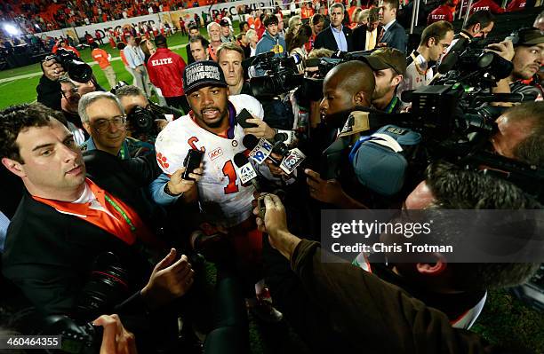 Tajh Boyd of the Clemson Tigers is interviewed by the media after defeating the Ohio State Buckeyes during the Discover Orange Bowl at Sun Life...