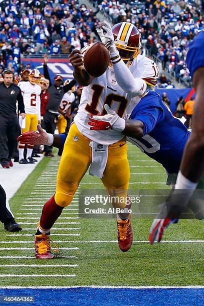 Robert Griffin III of the Washington Redskins fumbles the ball out of bounds in End Zone in the second quarter against the New York Giants during...