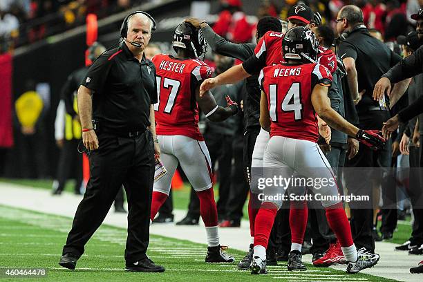 Head coach Mike Smith of the Atlanta Falcons stands on the sidelines in the first half against the Pittsburgh Steelers at the Georgia Dome on...