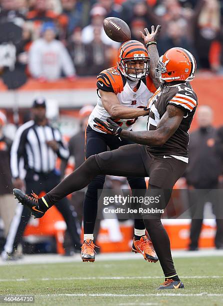 Josh Gordon of the Cleveland Browns can't make a catch in front of Leon Hall of the Cincinnati Bengals during the second quarter at FirstEnergy...