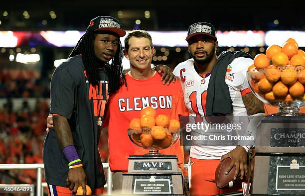 Sammy Watkins, head coach Dabo Swinney and Tajh Boyd of the Clemson Tigers celebrate after defeating the Ohio State Buckeyes during the Discover...