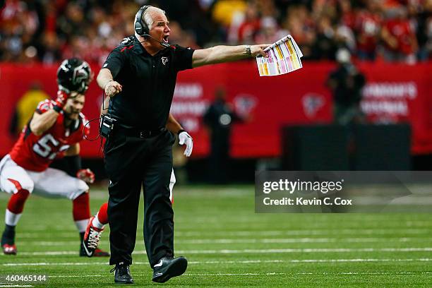 Head coach Mike Smith of the Atlanta Falcons reacts to a play in the second half at the Georgia Dome on December 14, 2014 in Atlanta, Georgia.