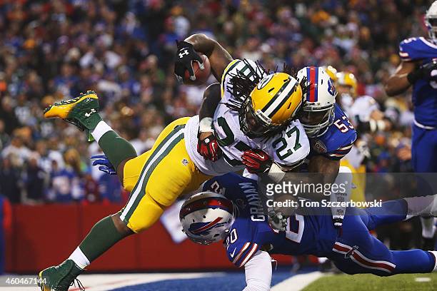 Eddie Lacy of the Green Bay Packers attempts to run a fumble recovery out of the endzone, resulting in a safety during the second half against the...