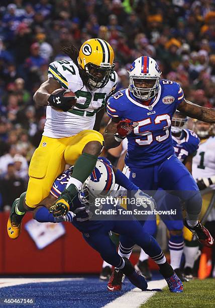 Eddie Lacy of the Green Bay Packers attempts to run a fumble recovery out of the endzone, resulting in a safety during the second half against the...