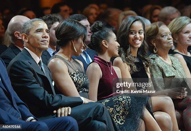 President Barack Obama, First Lady Michelle Obama, Sasha Obama, Malia Obama, and Marian Shields Robinson attend TNT Christmas in Washington 2014 at...