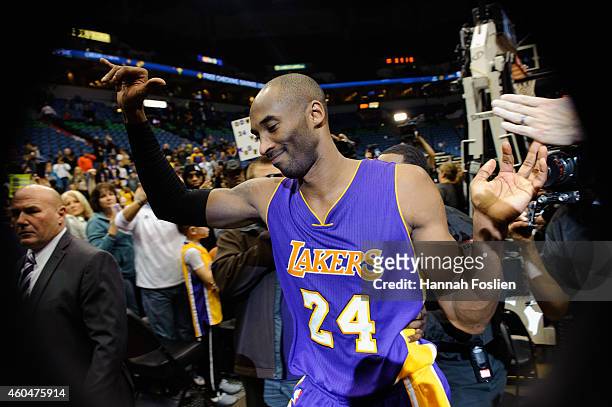 Kobe Bryant of the Los Angeles Lakers leaves the court after the game against the Minnesota Timberwolves on December 14, 2014 at Target Center in...