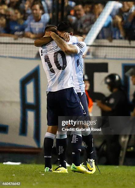 Ricardo Centurion of Racing Club celebrates with his teammate Gustavo Bou after scoring the opening goal during a match between Racing Club and Godoy...