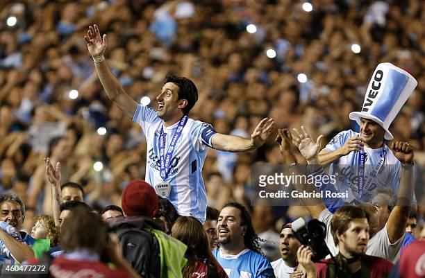 Diego Milito and Ivan Pillud of Racing Club celebrate the championship after winning a match between Racing Club and Godoy Cruz as part of 19th round...