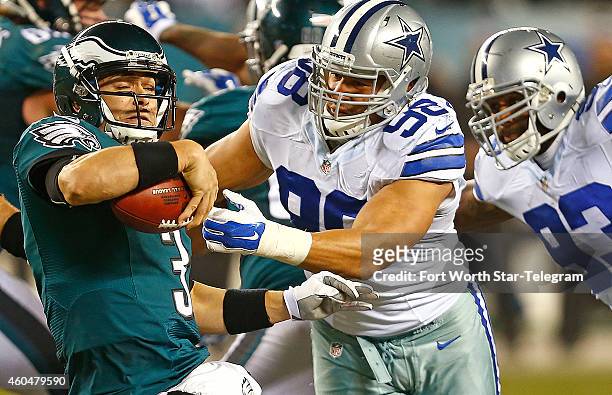 Philadelphia Eagles quarterback Mark Sanchez is sacked by Dallas Cowboys defensive end Anthony Spencer during the second half on Sunday, Dec. 14 at...