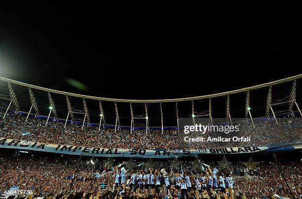 Players of Racing Club celebrate the championship after winning a match between Racing Club and Godoy Cruz as part of 19th round of Torneo de...